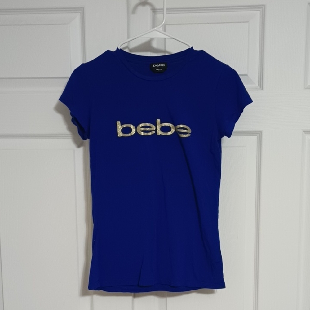 #24 Bebe Women's Royal Blue Color Short Sleeve Gold Accent T-Shirt. Size: Small
